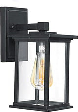 Black wall-mounted light fixture with clear glass cover on a white background