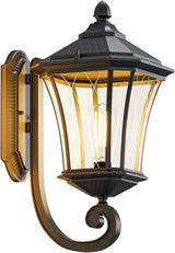 Decorative outdoor wall light fixture with black and bronze design on a white background