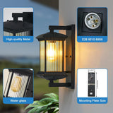 Outdoor wall light fixture with metal, glass, and mounting details.