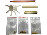 Set of keys, cylindrical objects, and small metal components on a white background