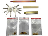 Set of keys, cylindrical objects, and small metal components on a white background