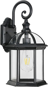 Black outdoor wall lantern with clear glass cover on a white background
