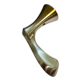 A modern curved cabinet pull handle with a brushed metallic finish, shown on a plain white background.
