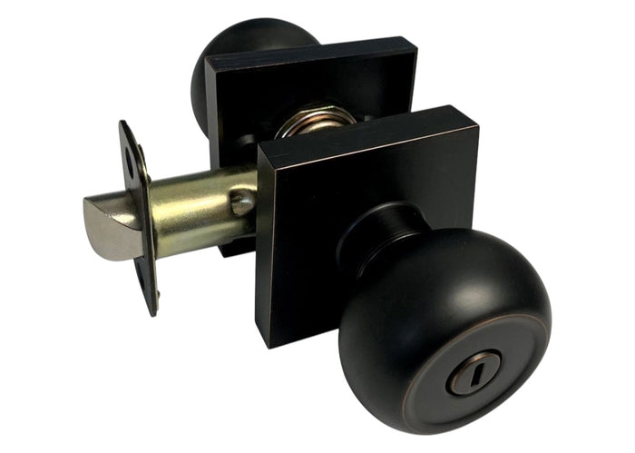 A dark oil rubbed bronze door knob set with a square plate and keyhole, including an inset image showing the knob's appearance from the inside.