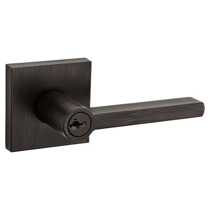 A Venetian bronze finish door handle with keyhole, part of the Kwikset Halifax Collection.