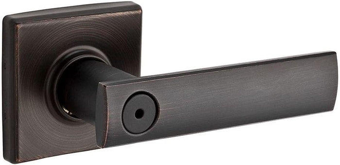 A Venetian bronze finish privacy door handle from the Vedani collection with a square rosette.