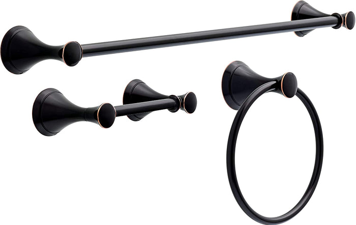 A set of three oil rubbed bronze towel bars, a tissue holder, and a towel ring, all from the Delta Carlisle Collection.