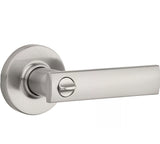 Satin nickel finish privacy door handle with round rosettes and a keyhole in the center.