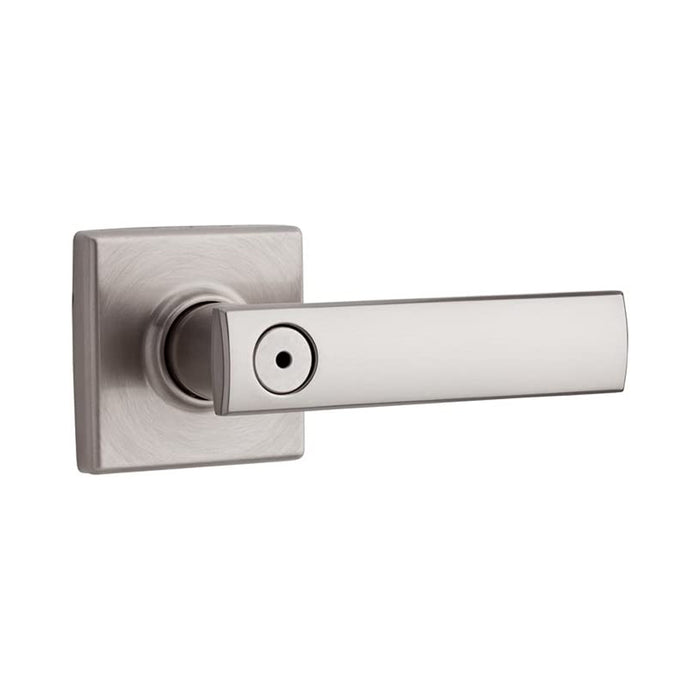 A satin nickel finish privacy door handle from the Vedani collection with a square rosette.