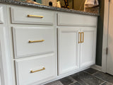 Satin Brass Cabinet pulls on white cabinets