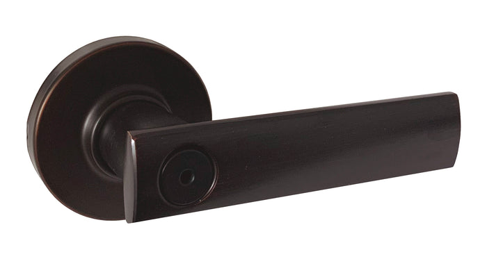 A Venetian bronze finish privacy door handle from the Vedani collection with round rosettes.