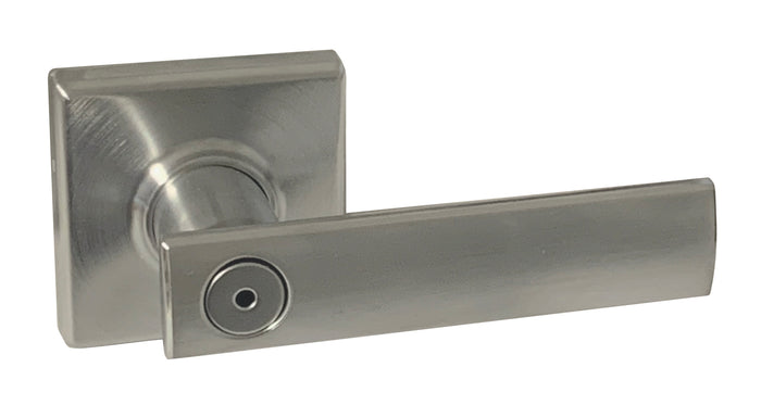 A satin chrome finish privacy door handle from the Vedani collection with square rosettes.