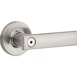 Satin nickel finish privacy door handle with round rosettes and a keyhole in the center.