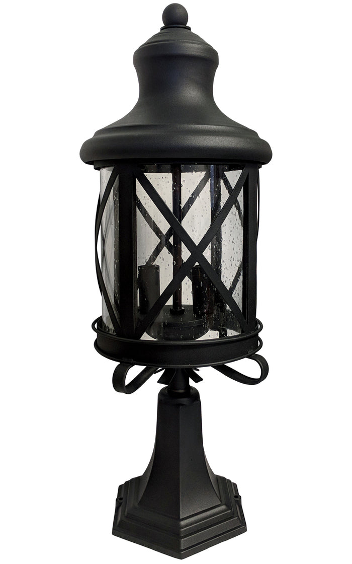 Black outdoor lantern with a rusted finish, raindrop glass, and a two-tiered design mounted on a base.