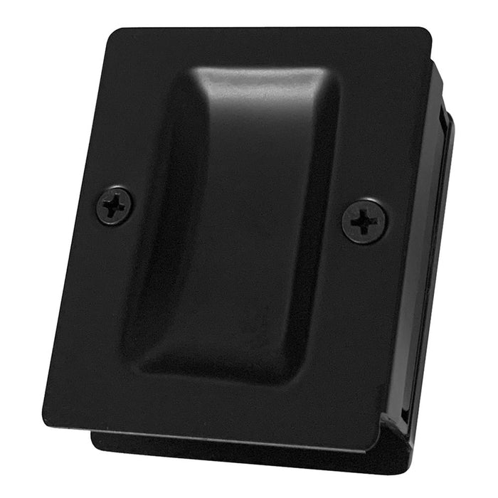 Black finish metal pocket door pull mounted on a door frame.