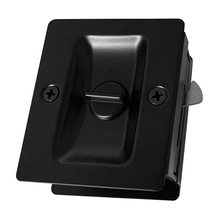 Black finish privacy pocket door pull with a keyhole, mounted on a door frame.