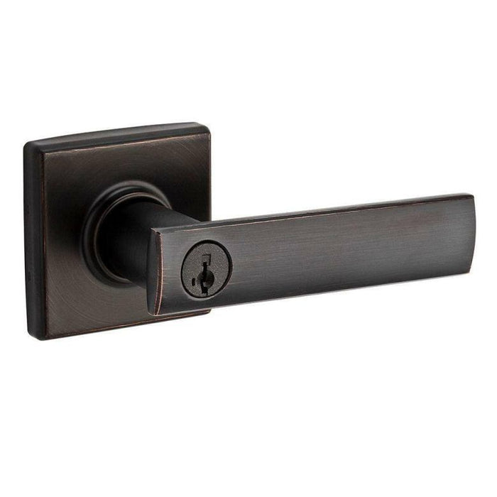 An entry door handle with a square rosette in Venetian Bronze finish, featuring a keyhole.