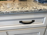 Image of cabinet pull on the cabinet