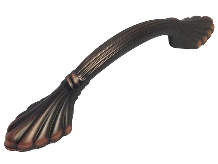 Oil rubbed bronze cabinet pull with a fluted design