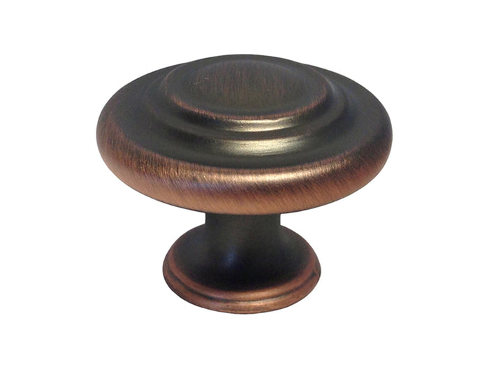Oil rubbed bronze round cabinet knob.