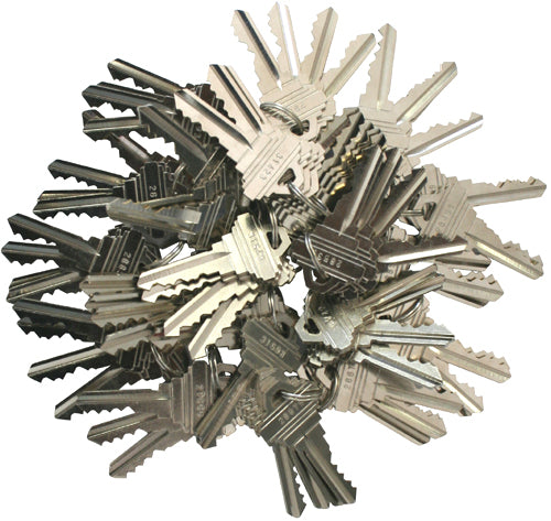 A collection of Schlage precut 5-pin SC1 keys, arranged in a cluster.